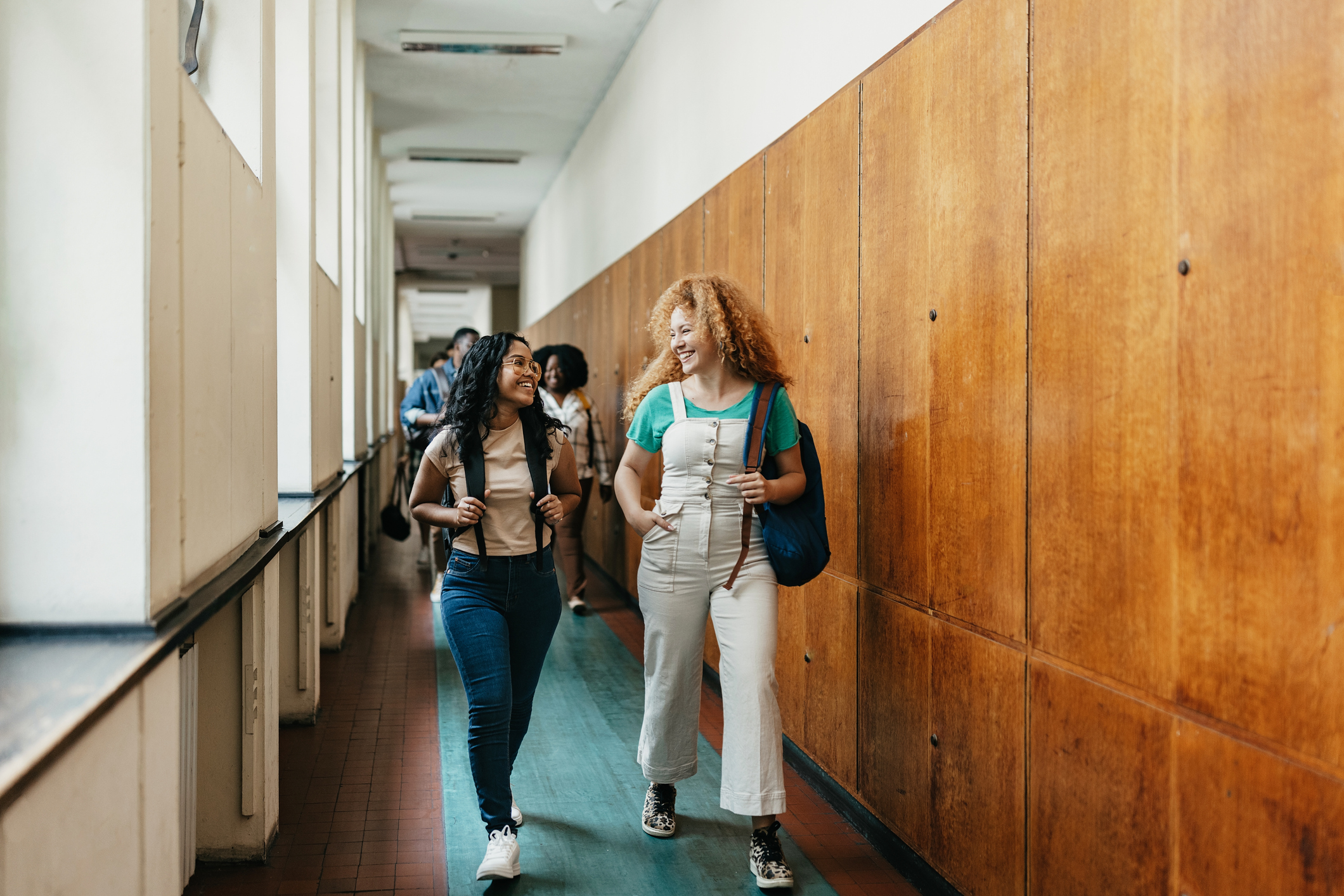 female students walking to classroom